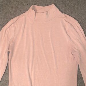 pink turtle neck